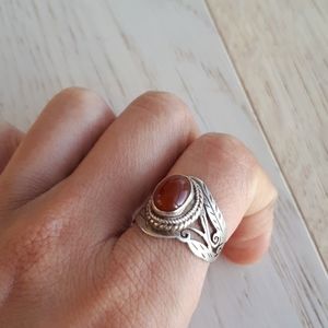 Silver ring with red gemstone ring